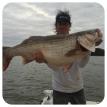 Lee Bullock Holding A Monster Lake Martin Striper